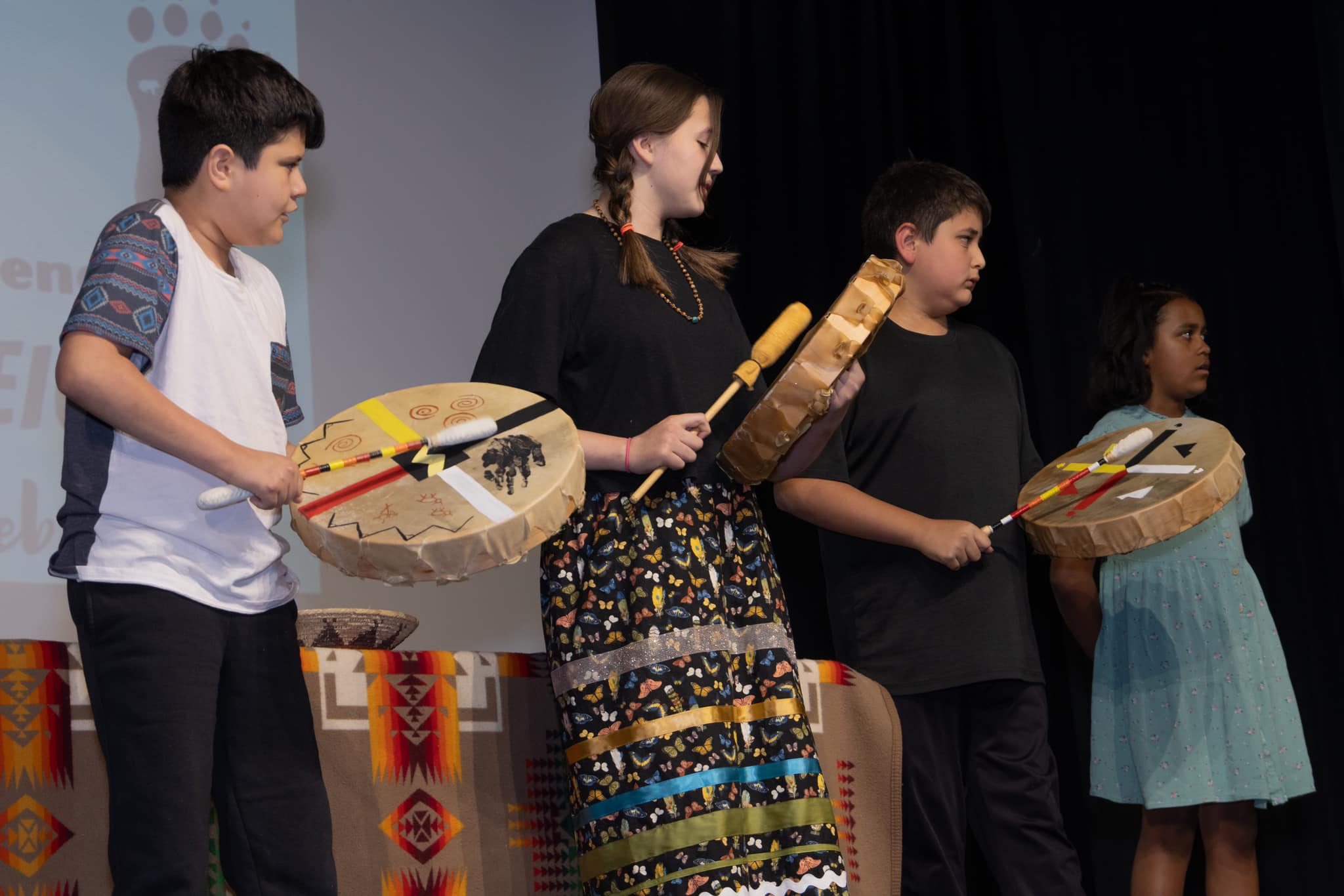 Title VI Students Perform with handdrums